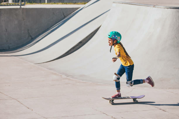 Young Girl Skateboarding in Skatepark