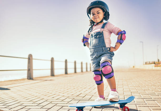 Skateboard, cool and girl with power in the city while riding during summer